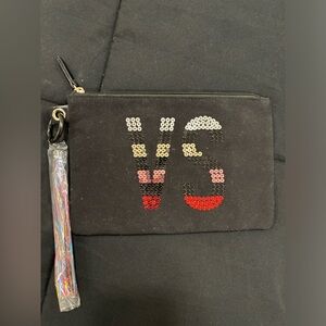 Victoria’s Secret makeup bag. New